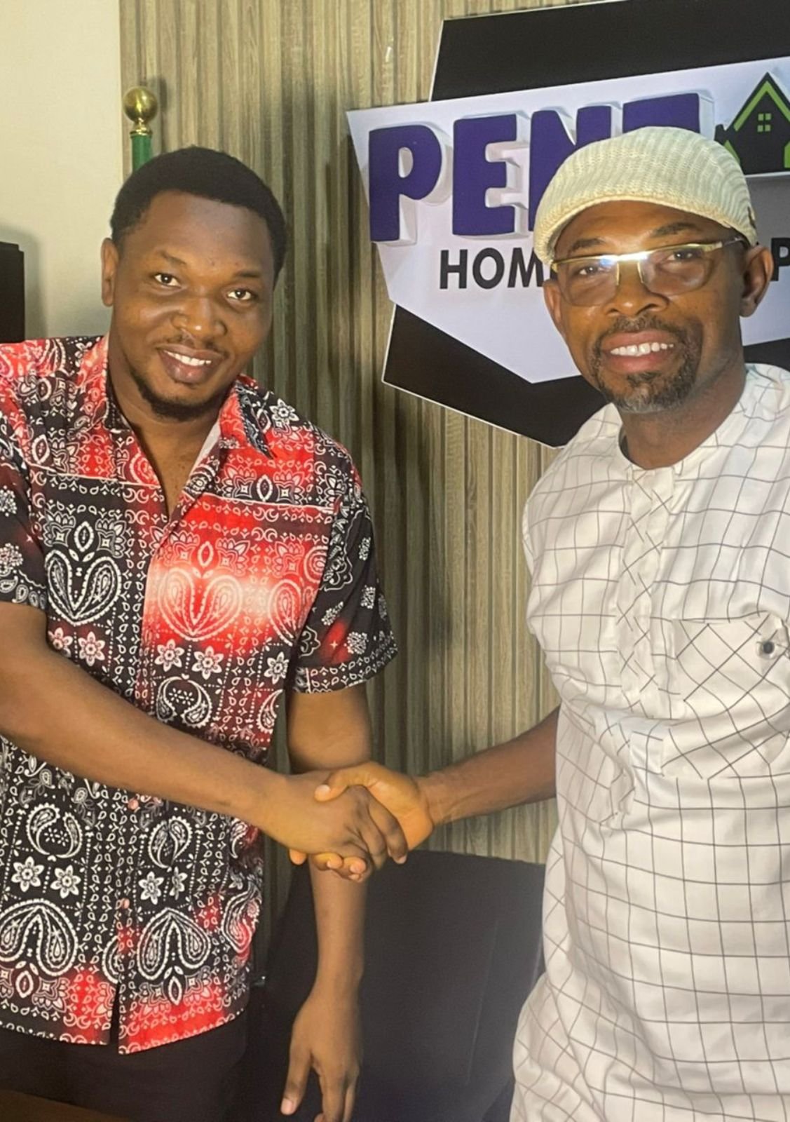Pentagon Homes representative with a client in Abuja